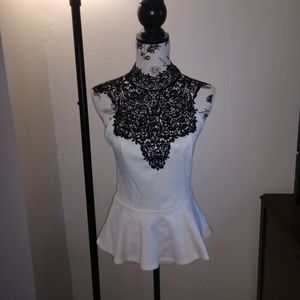 Cream sleeveless blouse w/ black lace